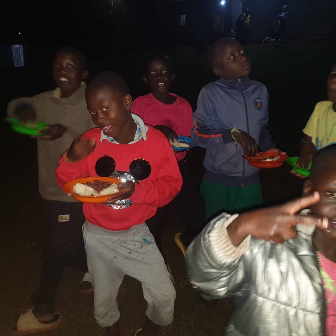 Students of Vision of Joy School sharing their evening meal